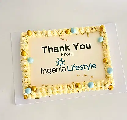 rectangle cake with corporate logo and designed to match the colour scheme